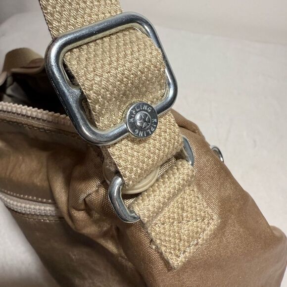 Kipling Gold Crossbody Bag with Adjustable Strap and Textured Finish - Picture 10 of 15